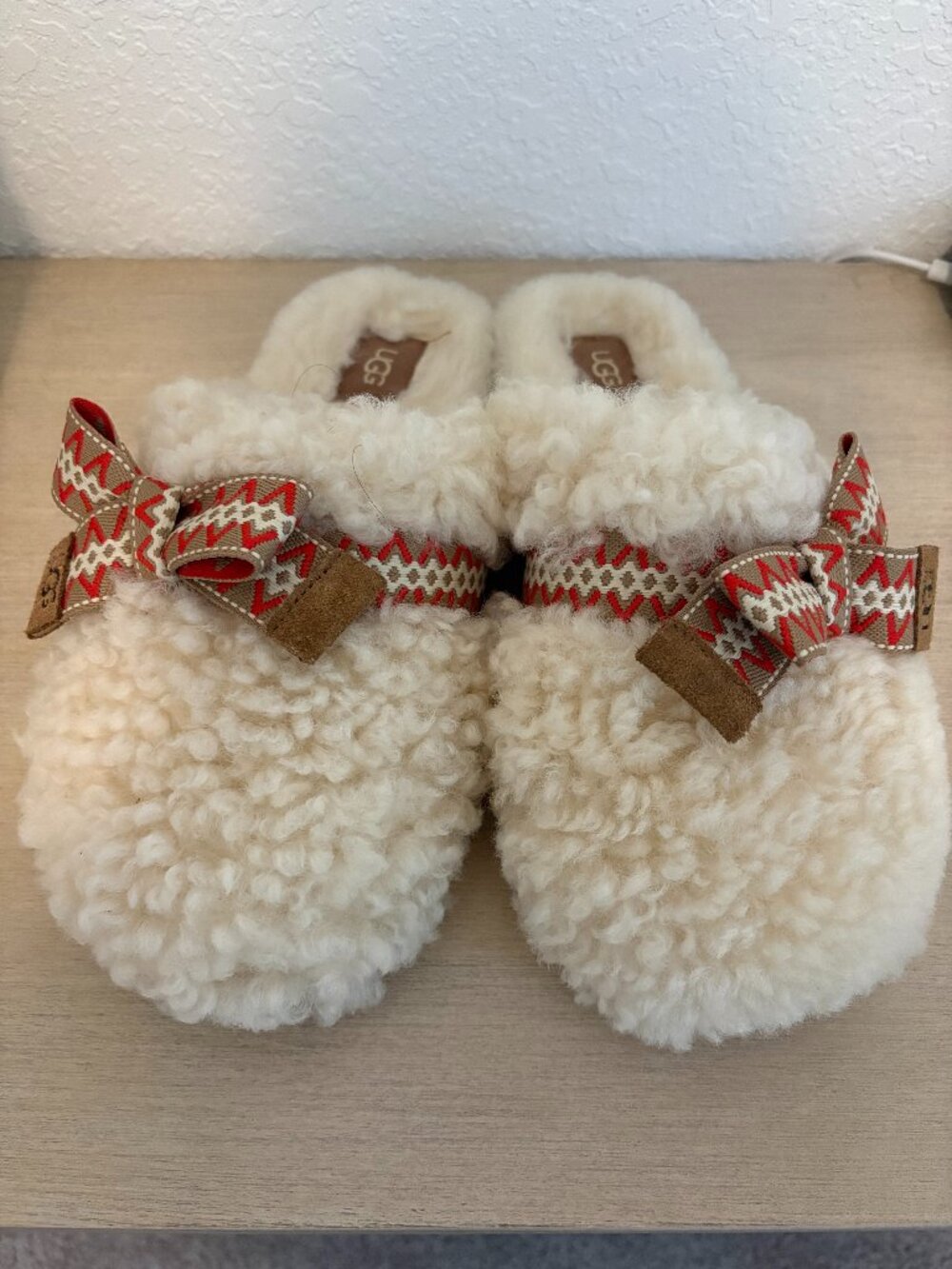 UGG Cream Shearling Slip-On Mules with Red Chevron Ribbon